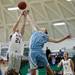 Skyline and Dexter players reach for a rebound in the game on Monday, Feb. 25. Daniel Brenner I AnnArbor.com
